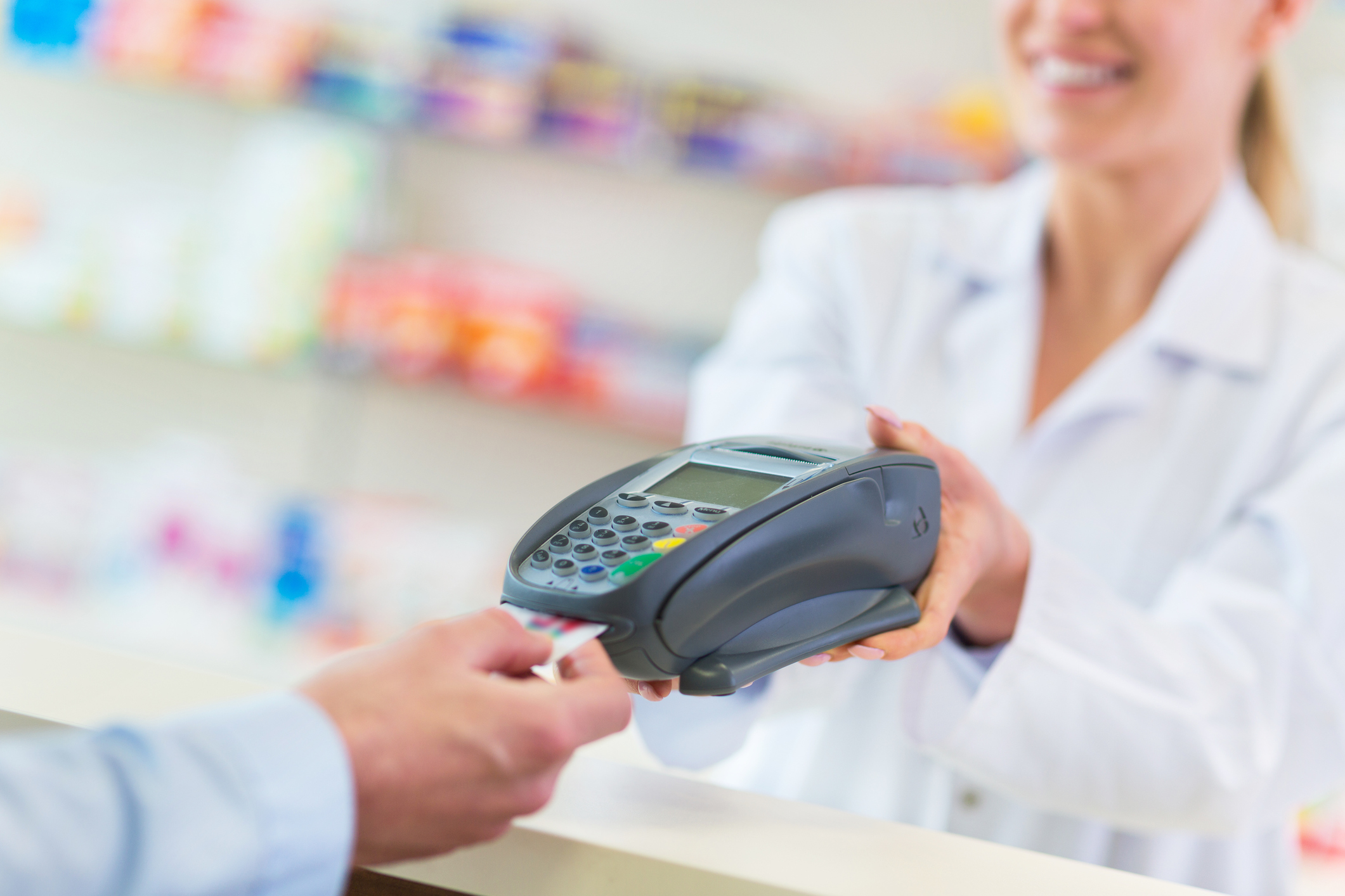health-food-store-pharmacist-assisting-customer